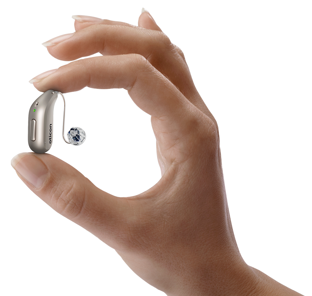 Hand hält Oticon Reveal Hörgerät zwischen Daumen und Zeigefinger